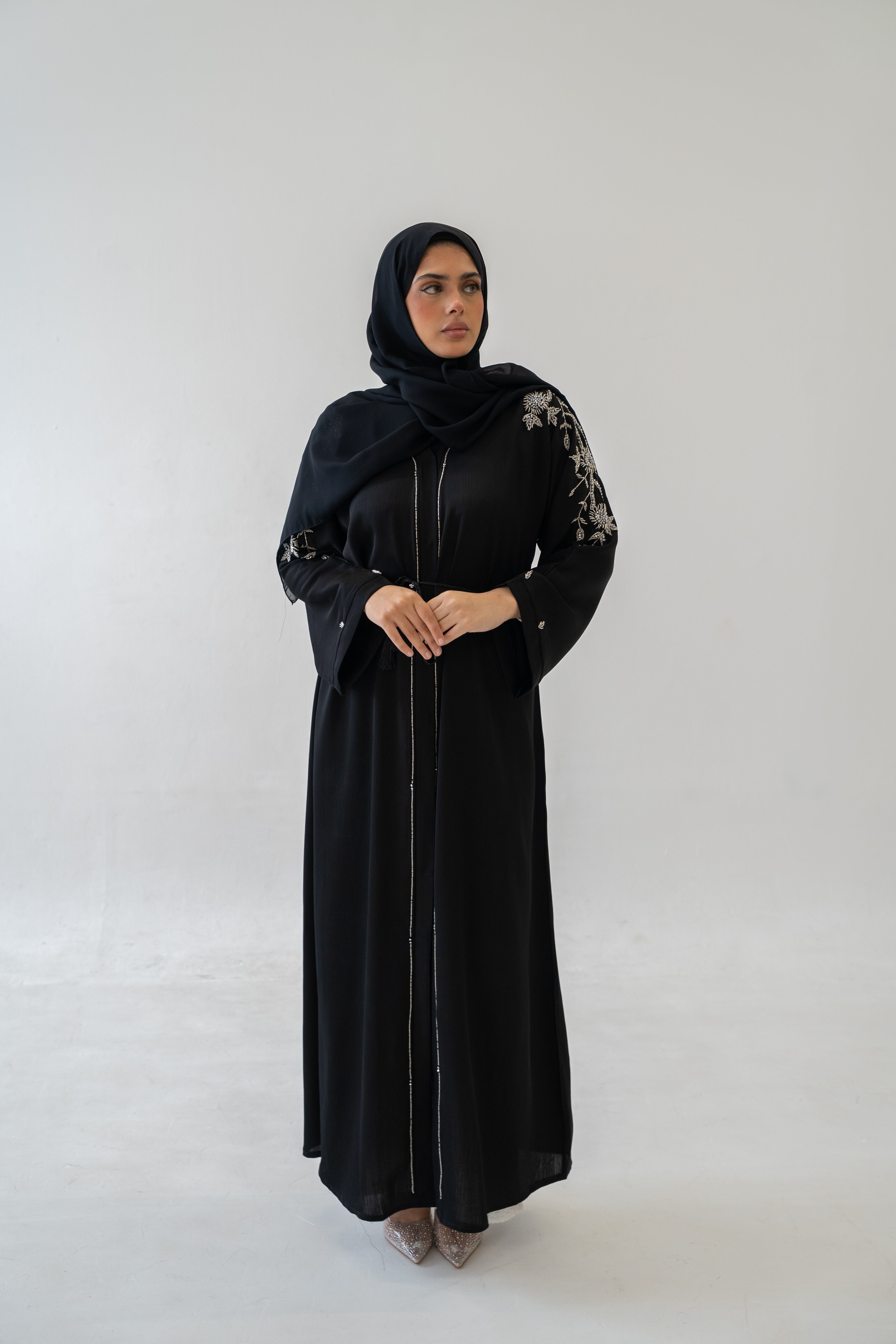 Side view of Abaya Hira Embroidered Crinkle Fabric modest silhouette