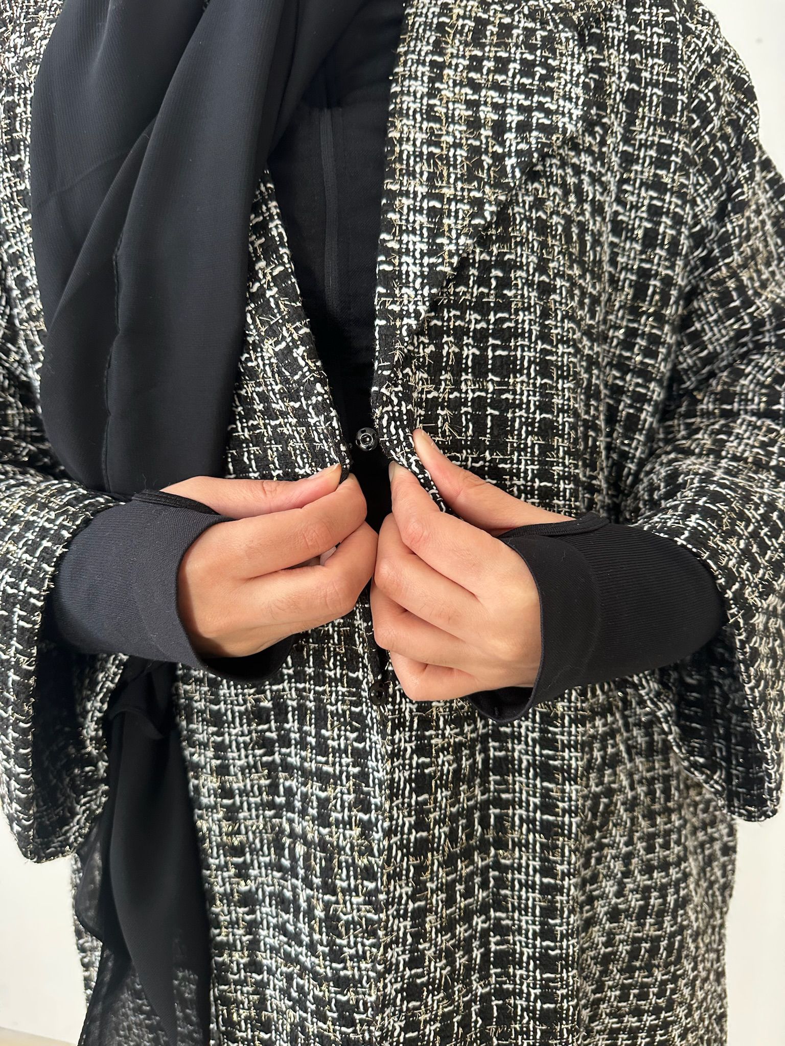 Model wearing Abaya Winter Coat black and white