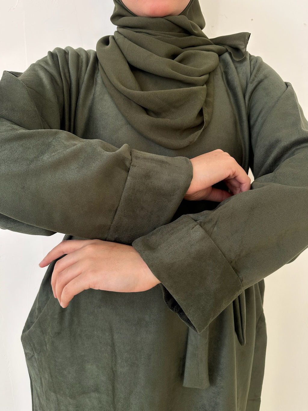 Side view of Suede Winter Abaya with pockets